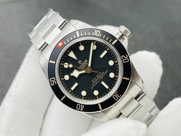 ZF Black Bay 58 79030N, black dial with gilt details, steel case and riveted-style bracelet, angled view