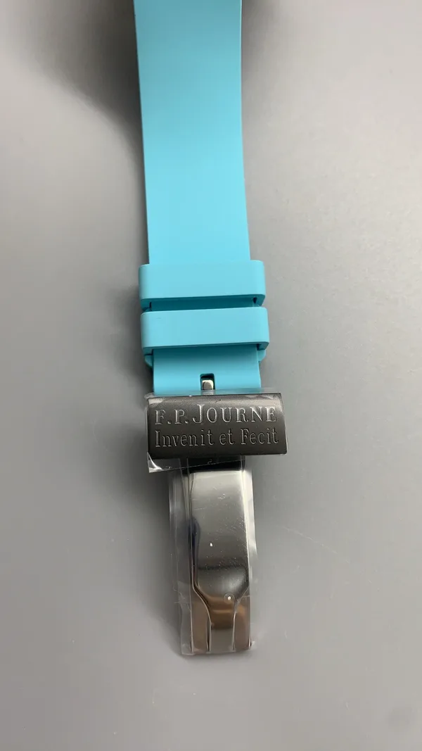 Élégante 48 mm replica, white dial, dark case, sky blue rubber strap