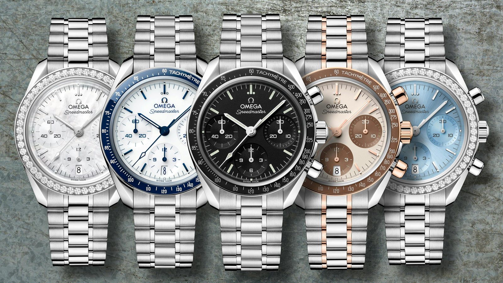Seven 38mm chronographs lined up on steel bracelets