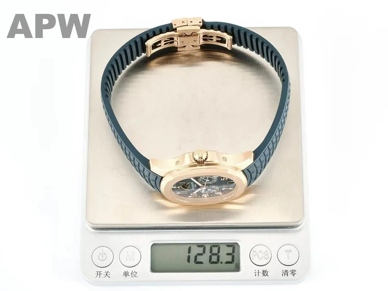 Watch on a digital scale reading 128.3 g