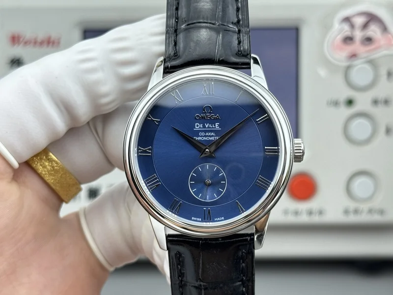 Blue dial with Roman numerals and small seconds, steel case, black alligator-pattern strap, front view