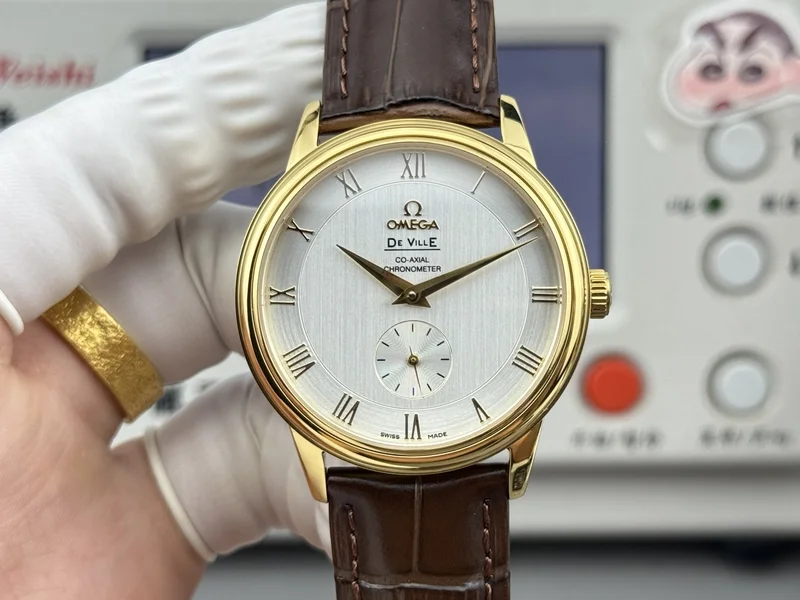 Silver dial with gold-tone Roman numerals, yellow-gold-tone case, brown alligator-pattern strap, front view