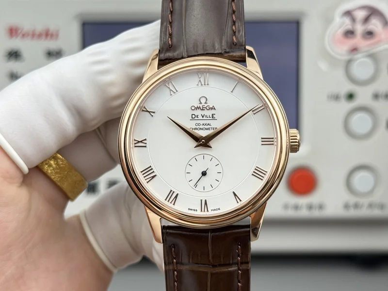White dial with rose-gold-tone numerals, rose-gold-tone case, brown alligator-pattern strap, front view