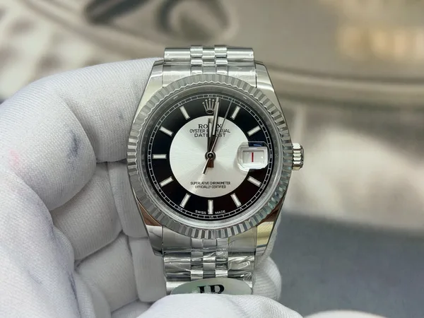 JR Datejust 36 116234, black and white tuxedo dial, fluted bezel, jubilee-style bracelet, front view