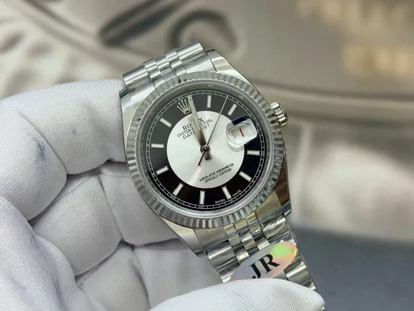JR Datejust 36 116234, black and white tuxedo dial, fluted bezel, dial, angled from the left