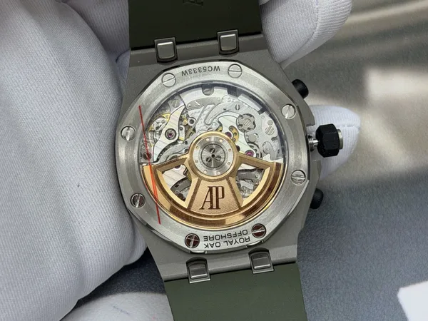 OCTA Royal Oak Offshore 26238, green dial, titanium case, movement close-up