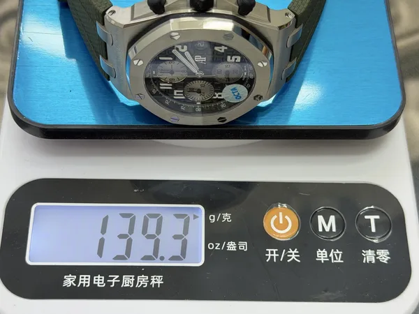 OCTA Royal Oak Offshore 26238, green dial, titanium case, on a scale
