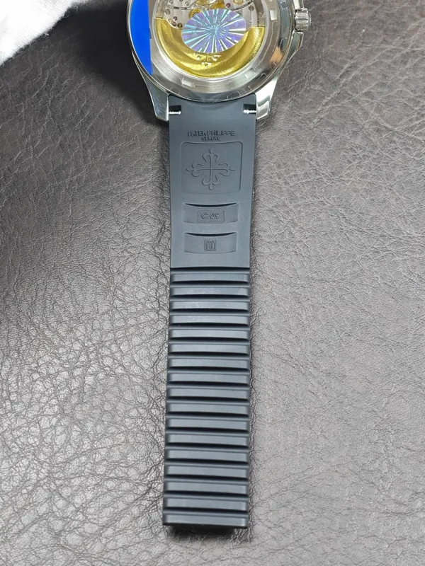 Strap underside with stamped markings and the display caseback edge
