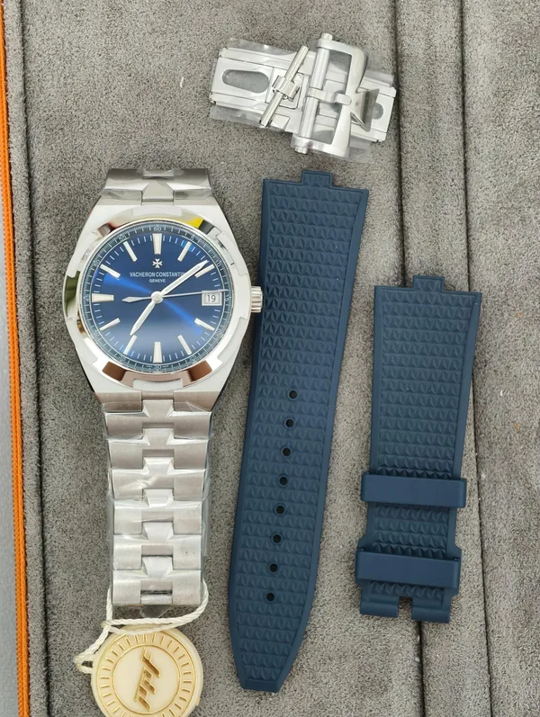 PPF Overseas 4500V, blue dial, with the rubber strap alongside