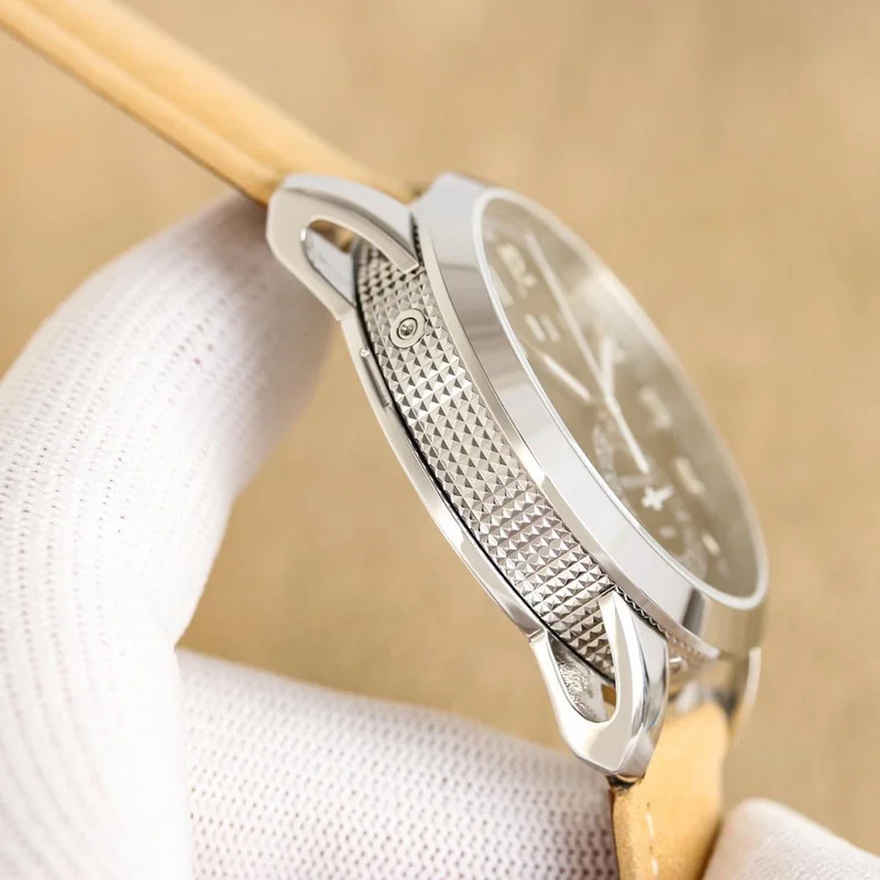 Case at an angle from the opposite side, showing the hobnail caseband and the skeletonised lugs