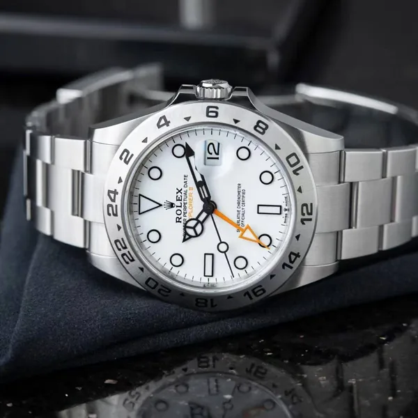 Watch resting on its side, three-quarter view