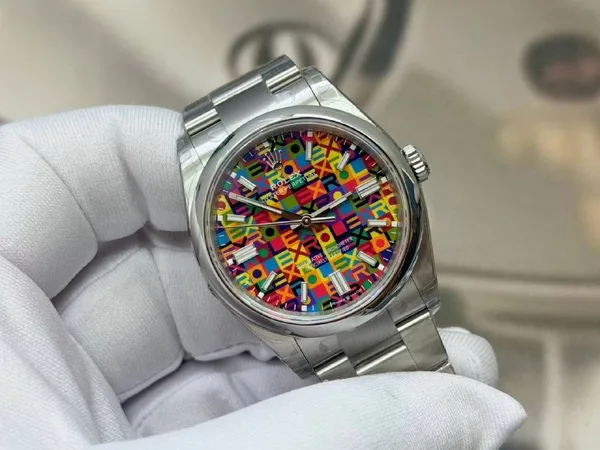 VSF Oyster Perpetual 36 126000, multicolour letter-mosaic dial, steel, dial, angled from the left