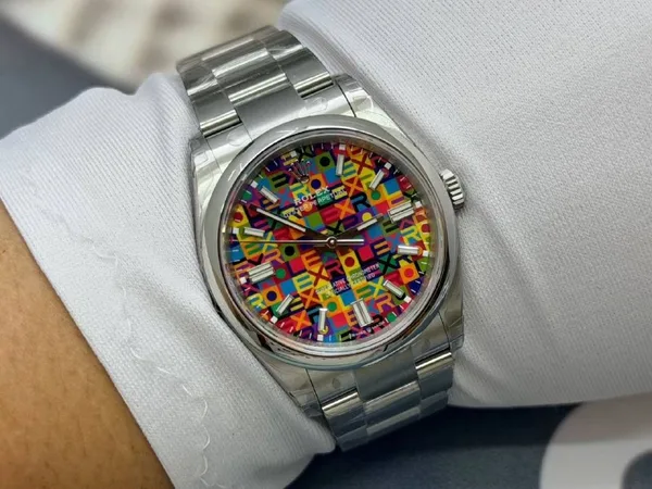 VSF Oyster Perpetual 36 126000, multicolour letter-mosaic dial, steel, on the wrist