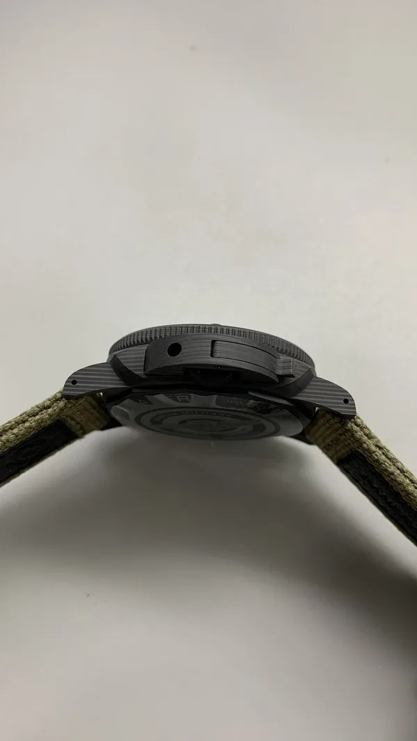 VSF Submersible Marina Militare PAM1698, carbon case, green gradient dial, case profile, crown guard side