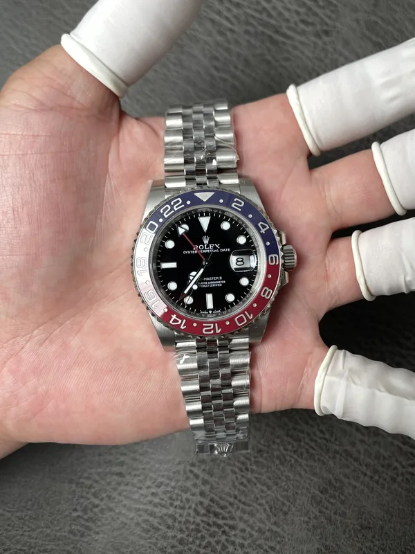 Rich Factory GMT-Master II 126710BLRO Pepsi, jubilee-style bracelet, dial view, flat on the hand