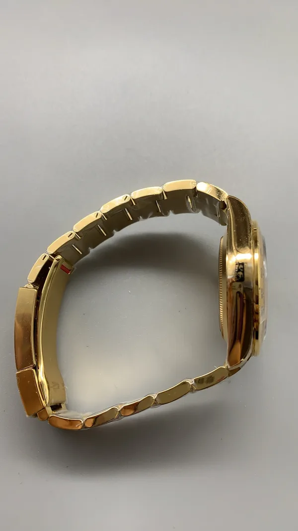 VSF Daytona 116508, green dial, yellow-gold-tone case, bracelet, other side