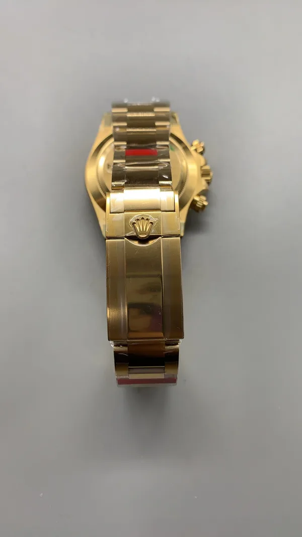 VSF Daytona 116508, green dial, yellow-gold-tone case, crown side