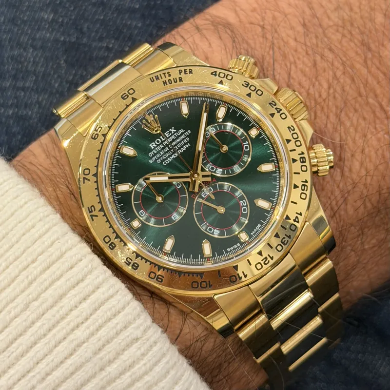 VSF Daytona 116508, green dial, yellow-gold-tone case, on the wrist